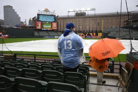 Patient fans wait out 5-hour rain delay for Royals vs. Orioles